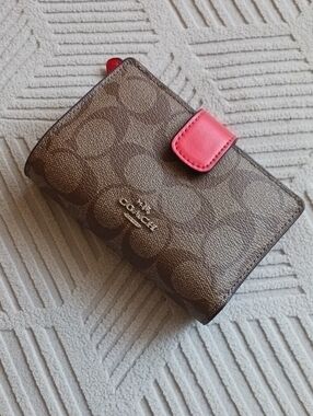 Coach Brown Signature Canvas Wallet with  Orange Snap Tab And Branded Dust Pouch